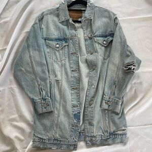 Distressed long Jean jacket light blue